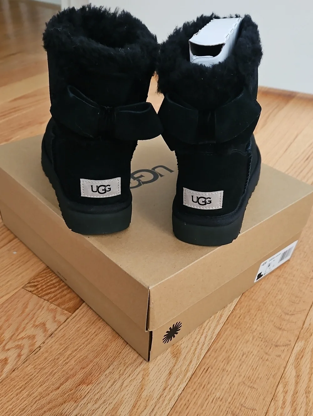 UGG Black Mini Bow Shearling Boots